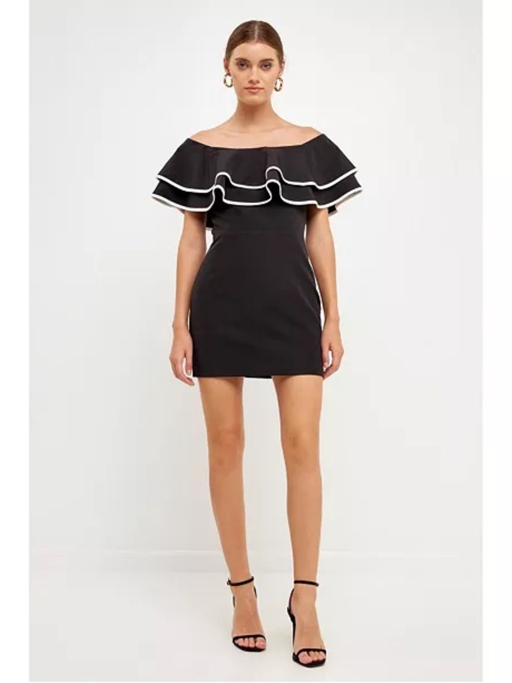 #NWT Endless Rose
Black and white mini dress with ruffle neck line
Size L